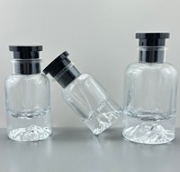 Flacon de parfum de luxe en verre transparent avec base en forme de montagne, capuchon pulvérisateur noir, flacon de parfum rechargeable