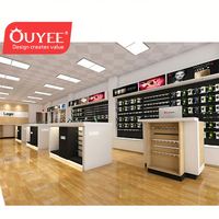 Idées de décoration intérieure pour magasin de téléphonie mobile, matériaux en bois MDF et métal, garantie de 3 ans, magasins d'électronique, marque OUYEE