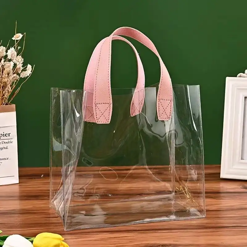 حقيبة تسوق رخيصة مضادة للماء شفافة شفافة من مادة كلوريد البولي فينيل على الكتف بشعار مخصص