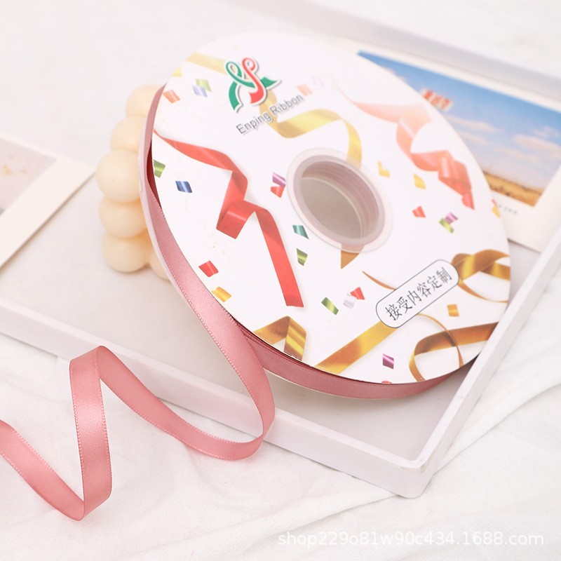 สีชมพูฝุ่น-1ซม. ม้วนละ 100 หลา