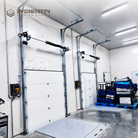 Porte sectionnelle industrielle Everbesten, panneaux en acier avec mousse PU de 40-80 mm, rail de levage haute performance pour entrées d'usines