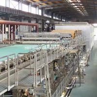 Machine de fabrication de rouleaux de papier toilette sanitaire recyclés à partir de papier usagé et de pâte à papier