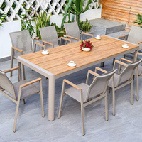 Chaise de patio extérieure OEM ODM en tissu textilène imperméable avec cadre en aluminium, chaise de jardin avec accoudoirs pour projets hôteliers, approvisionnement en gros