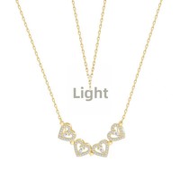 Collier Cœur Magnétique Trèfle à Quatre Feuilles en Gros, Pendentif en Cuivre Entièrement Sertie de Zircons, Plaqué Or, Bijoux de Luxe Inoxydables