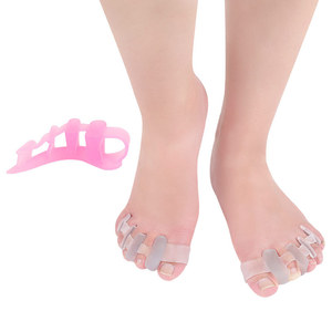 Venta al por mayor juanete Gel <span class=keywords><strong>de</strong></span> silicona del dedo del pie <span class=keywords><strong>separador</strong></span> dedo en la camilla <span class=keywords><strong>de</strong></span> - Product Image 1