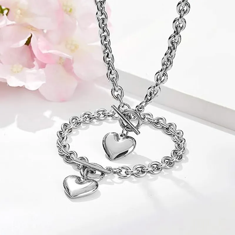 Ensemble de bijoux en acier inoxydable or rose 18 carats avec pendentif en forme de cœur et chaîne + bracelet en forme de cœur pour femmes et filles