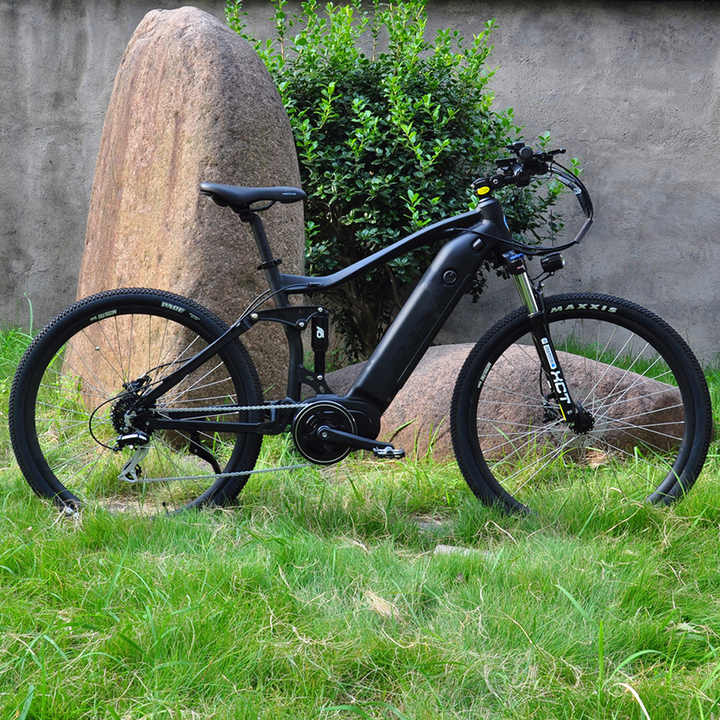 electric bicycle mid motor K9 Carbon / Mid-drive Fat Tire MTB with five levels of pedal assist to help you tackle hills and headwinds effortlessly Mountain Electric Bike with Bafang