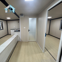 Villa préfabriquée de luxe de 2 à 4 chambres à coucher Maison en conteneur extensible de 20 à 40 pieds Maison mobile portable pliable pour immeuble de bureaux