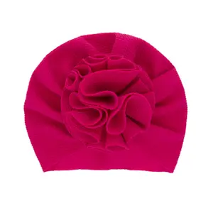 Cappello all'ingrosso della gomma del fiore della copertura di colore solido del cappello del turbante del bambino grande per gli accessori dei capelli del bambino