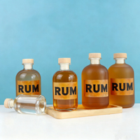 Bouteille à spiritueux en verre transparent de luxe de qualité supérieure avec bouchon et finition mate givrée pour l'emballage du whisky et la présentation en cadeau