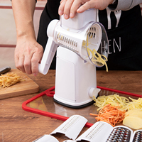 Trancheuse à tambour sécurisée blanche à manivelle avec lames en acier inoxydable pour la cuisine