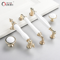 Poignées et boutons de porte en alliage de zinc en céramique blanche moderne de luxe de 128mm or K de haute qualité pour armoires de cuisine tiroirs de commode