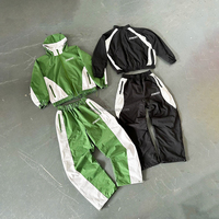 Ensemble survêtement de jogging de haute qualité avec veste coupe-vent à fermeture éclair et pantalon baggy en nylon uni personnalisé