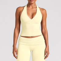 Nouvel ensemble de sport et yoga 2026 blanc et noir avec débardeur push-up et short pour femme