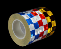 Tissu laminé en cristal hautement réfléchissant pour vêtements, avec des matériaux en PVC/Nylon/PET, fabriqué dans le Fujian
