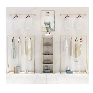 customized fashion metal shop fitting lady apparel retail store stand gold clothes display garment boutique clothing rack