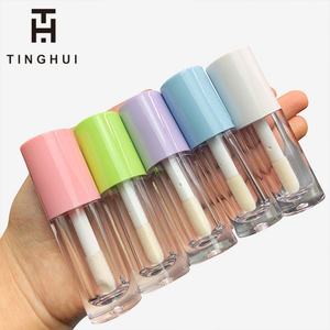 ขวดลิปกลอสสีสันสดใสขนาด 6 มล. แบบกำหนดเอง พร้อมแปรงทาหนาและหัวแปรงขนาดใหญ่ บรรจุภัณฑ์เครื่องสำอางแบบหลอดลิปกลอสเปล่าพร้อมแปรงทาหนาและหัวแปรงขนาดใหญ่ - Product Image 1