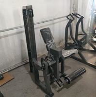 Appareil de musculation professionnel réglable à charge par pignon pour l'extension des jambes assis