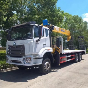 Camion à plateau multifonctionnel HOWO à vente chaude, longueur de plateau de 8,5 m - Transporte des machines de 25 tonnes, avec treuil de 11 tonnes, grue XC <span class=keywords><strong>MG</strong></span> de 10 tonnes - Product Image 4