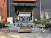 Machine de remplissage automatique de liquides en bouteille à grande vitesse pour les produits alimentaires et cosmétiques