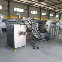 Machine à broyer la viande congelée pour la transformation des blocs de bœuf et de porc, et la manutention des matières premières de viande.
