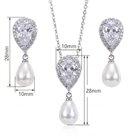 Tendances 2026 : Parure de bijoux de luxe en cuivre, ensemble collier et boucles d'oreilles en zircon CZ goutte d'eau, parures de mariage, parure de bijoux de mariée en perles pour femme