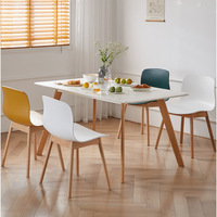 Chaise de salle à manger nordique au design minimaliste, mobilier de maison, siège en bois massif, dossier rotatif inspiré d'Instagram pour petites maisons et cafés