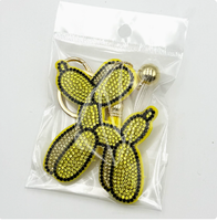 Nouveau porte-clés Halloween personnalisé orné de strass, breloque en métal avec pompon, accessoire de sac créatif, best-seller