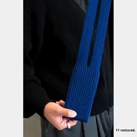 Nouvelle pochette pour téléphone en tricot avec un design élégant à plis, adaptée à tous les modèles de smartphones