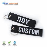 Fabricant de porte-clés en textile tissé personnalisé avec logo brodé à la machine, promotionnel, en sergé, vente en gros à prix abordable