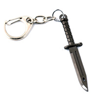 6 modèles de colliers et porte-clés en alliage, style couteaux de jeu M9 et couteaux griffes