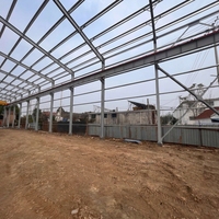 Bâtiment préfabriqué en structure métallique abordable pour le développement d'entrepôts e-commerce, de hubs logistiques et de centres de distribution