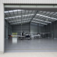 Hangar préfabriqué en structure métallique pour installations aéronautiques, stockage d'avions et construction de projets