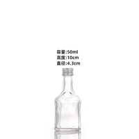 Botol Minuman Keras Kaca Mini Kosong 50ml 100ml Botol Wiski Brandy Anggur Kecil Dengan Tutup Sekrup Aluminium untuk Hadiah Sampel Logo Kustom
