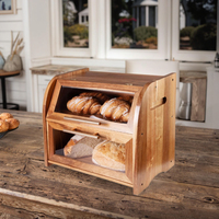La boîte de rangement à pain à deux couches en bois d'acacia avec des couvercles de fenêtre en verre pour le stockage des aliments dans la cuisine.