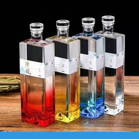 Bouteille à liqueur en verre avec peinture en spray noir or argent orange avec sérigraphie givrée