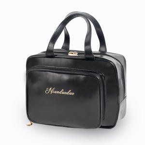 Nianduoduo – trousse à cosmétiques de grande capacité, étanche, multifonctionnelle, pour femmes, usage quotidien, couleur unie, poignée souple - Product Image 1
