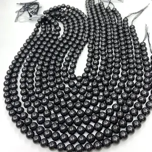 Commercio all'ingrosso naturale 6-12mm Russia Shungite gemma colore nero perlina allentata stong minerale Shungite <span class=keywords><strong>String</strong></span> - Product Image 1