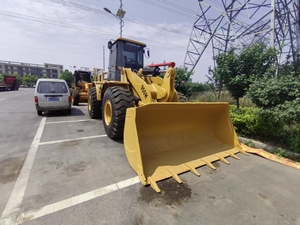 รถเกรดเดอร์ล้อยาง CAT 950H มือสอง ยี่ห้อญี่ปุ่น เกียร์ธรรมดา เครื่องยนต์และเกียร์บ็อกซ์เดิม สีเหลือง แท้ 100% ผลิตในญี่ปุ่น รุ่นปี 2022 - Product Image 2