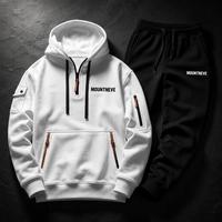 Conjunto de chándal de punto gofrado para hombre con sudadera con capucha, cremallera, bolsillos canguro, bolsillos con cremallera en las mangas, puños elásticos, estilo lounge y urbano, producción OEM