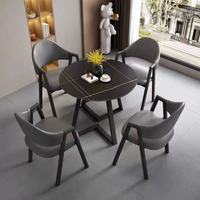 Table à manger moderne en pierre frittée à pieds en métal Mobilier de maison imperméable et non toxique