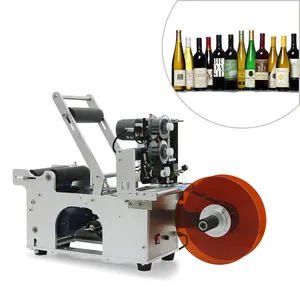 Simple semi-automatic labeling machine for plastic bottles/glass bottles with pull rod and printing date labeling machine
