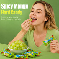 Bonbons durs vertes saveur mangue épicée, fourrées aux pépites de piment, style mexicain, douceur et chaleur, en vrac