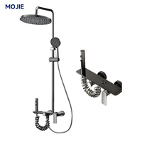 Ensemble de douche moderne en aluminium spatial à installation apparente avec pommeau de pluie rond, douchette à main, bidet et bec cascade