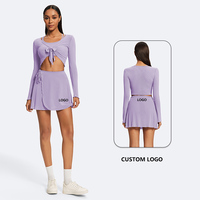 Haute qualité personnalisé vente en gros nouvelle tendance 2 pièces à manches longues cardigan court en maille à nouer et jupe pétale en maille détachable pour femmes