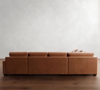 Canapé d'angle de luxe de style nordique avec accoudoirs carrés, assise profonde, chaise longue en L, coussins lombaires amovibles et structure robuste pour salon