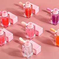 Op maat gemaakte logo-doodle transparante lipgloss OEM kleine oplage ondersteuning hydraterende anti-kloofjes aardbei watermeloen fruit lipgloss