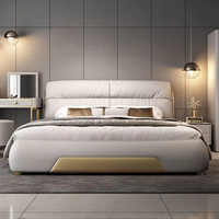 Lit de luxe Chambre à coucher principale moderne et minimaliste Lit King-Size Influenceur italien Lit en cuir véritable Rangement haut de gamme et élégant