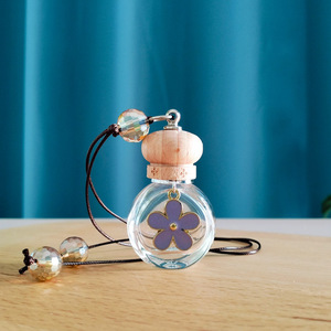 Nouveauté Pendentif plat rond pour parfum de voiture Pendentif <span class=keywords><strong>marguerite</strong></span> colorée Bouteille diffuseur d'arôme d'huiles essentielles - Product Image 5
