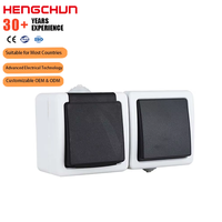 Interruptor y enchufe de la serie GT de superficie nominal IP54 impermeable Europea PC ABS de alta calidad con soporte de latón para uso en interiores y exteriores